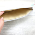 Load image into Gallery viewer, Inside of quilted zipper pouch.