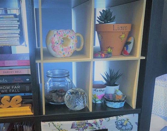 4 cubby cube insert from thesteadyhandshop.com filled with decor