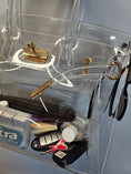 Load image into Gallery viewer, Clear Birkin shaped bag filled with personal items.
