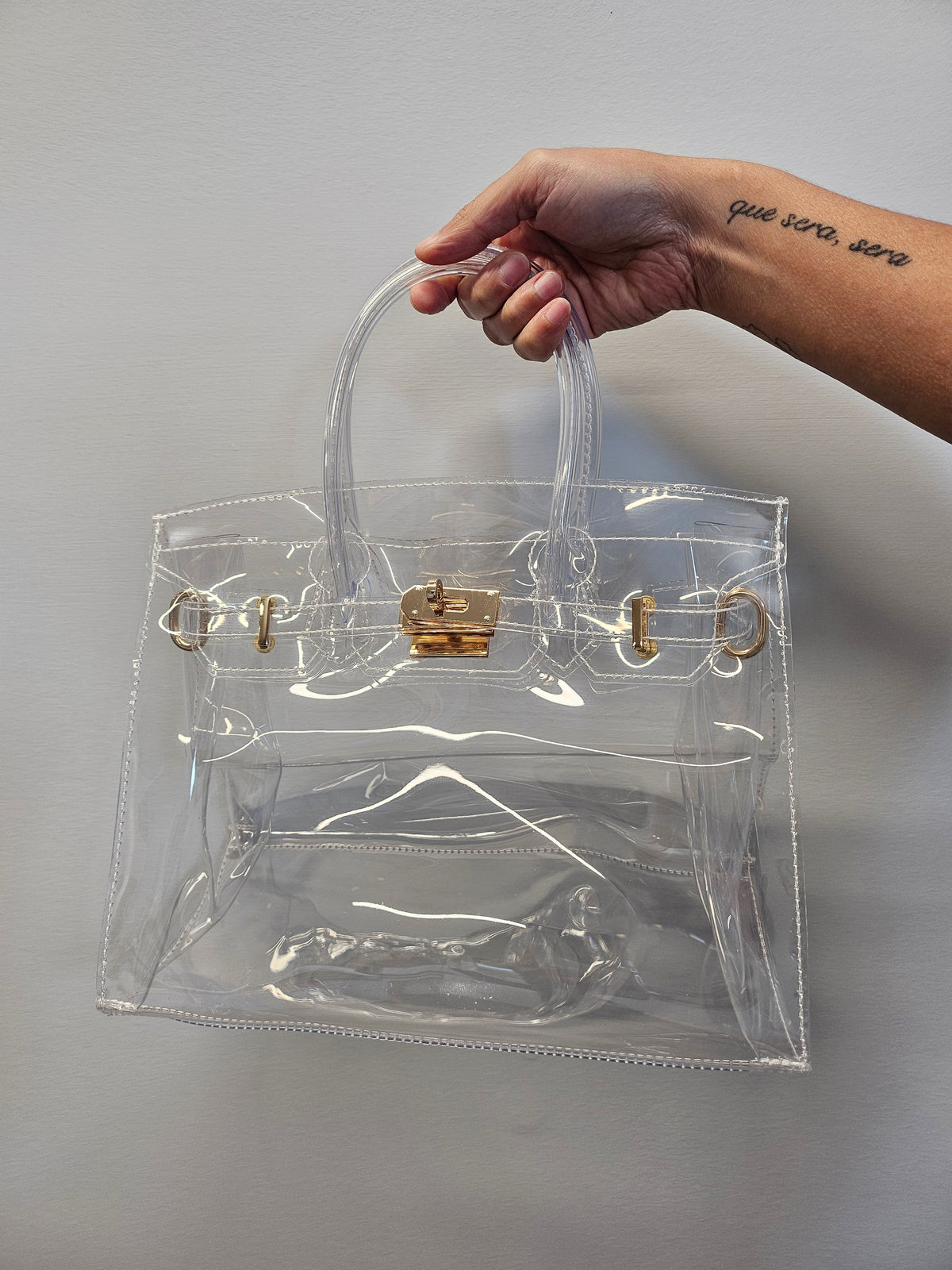 Clear Birkie tote bag with detachable crossbody strap.