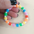 Load image into Gallery viewer, Rainbow colored bracelet.
