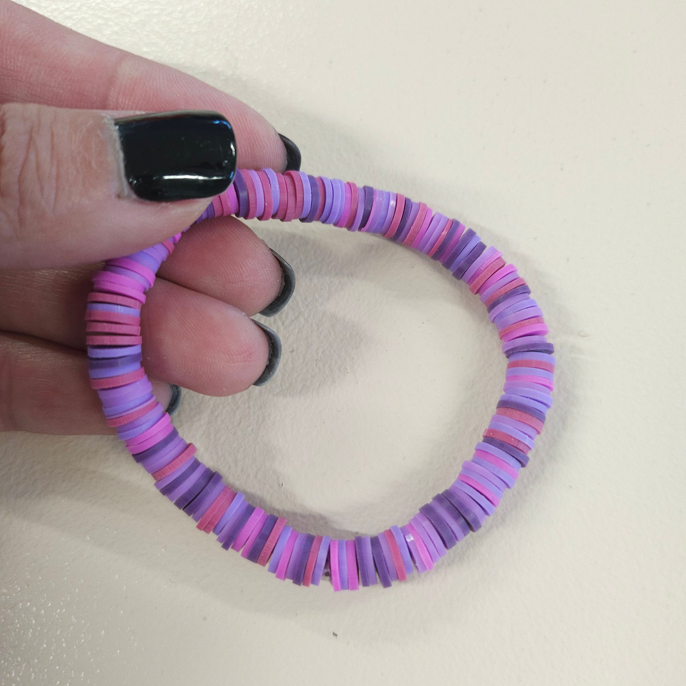 Purple bracelet.