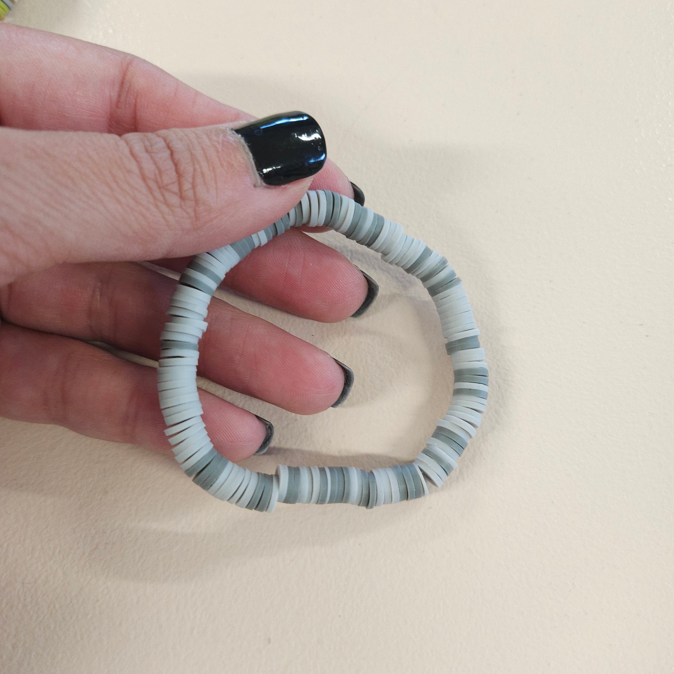 Gray bracelet.