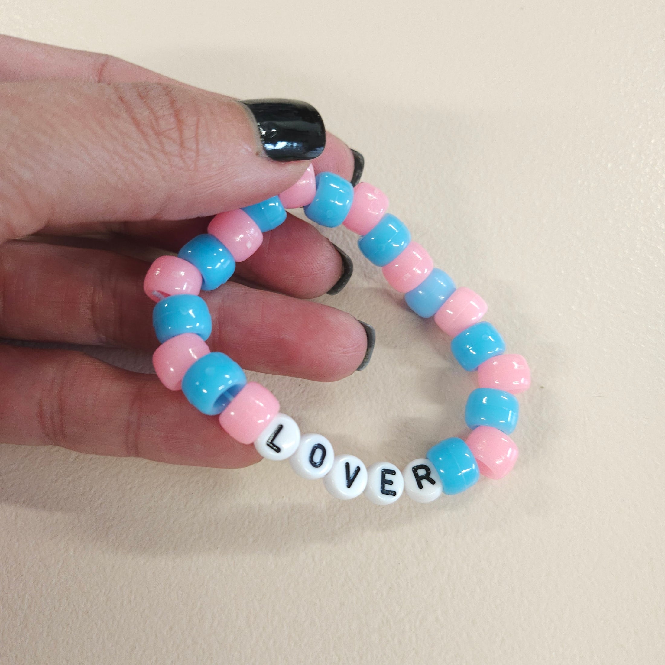 Lover swiftie friendship bracelet.