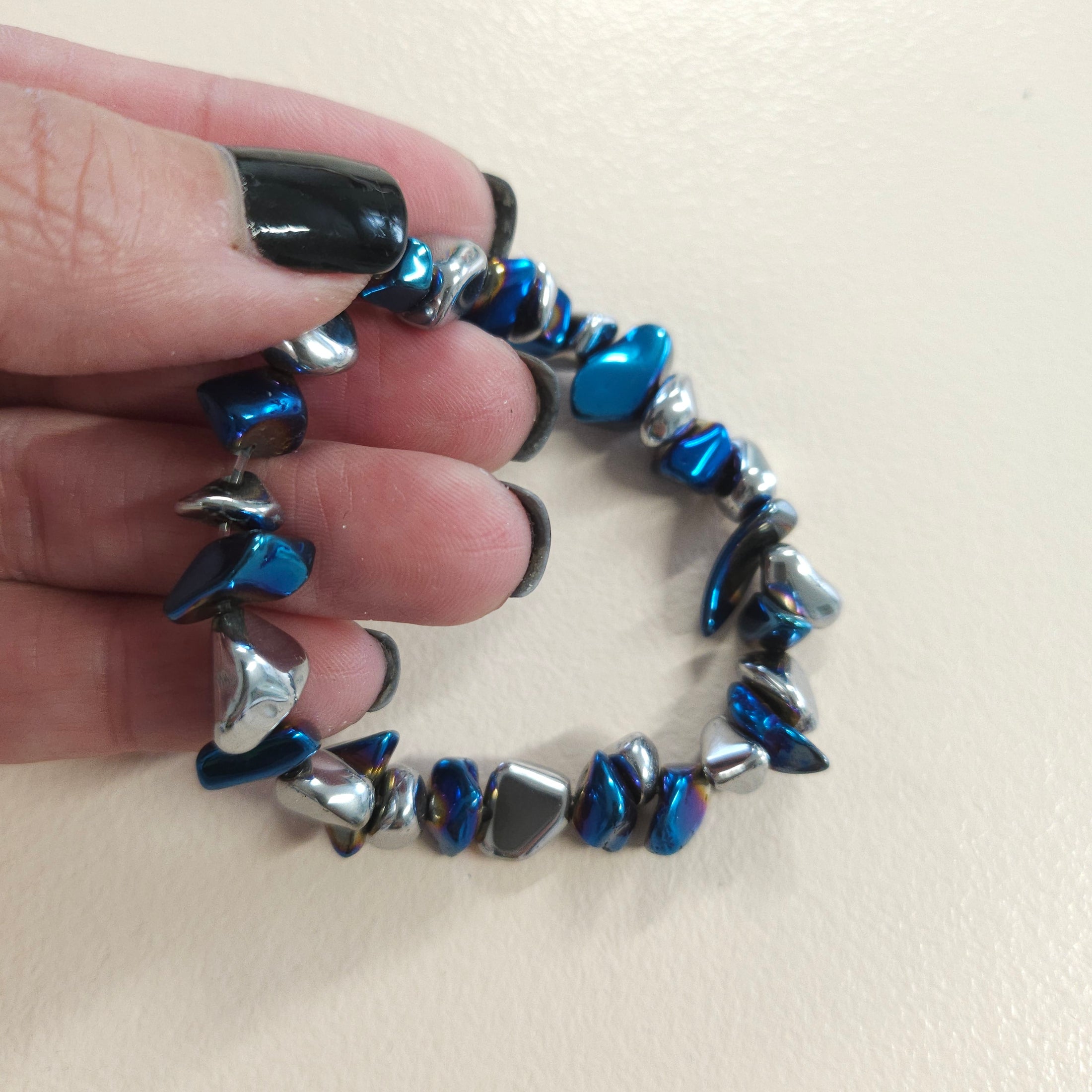 Silver and blue metallic rock stretch bracelet.