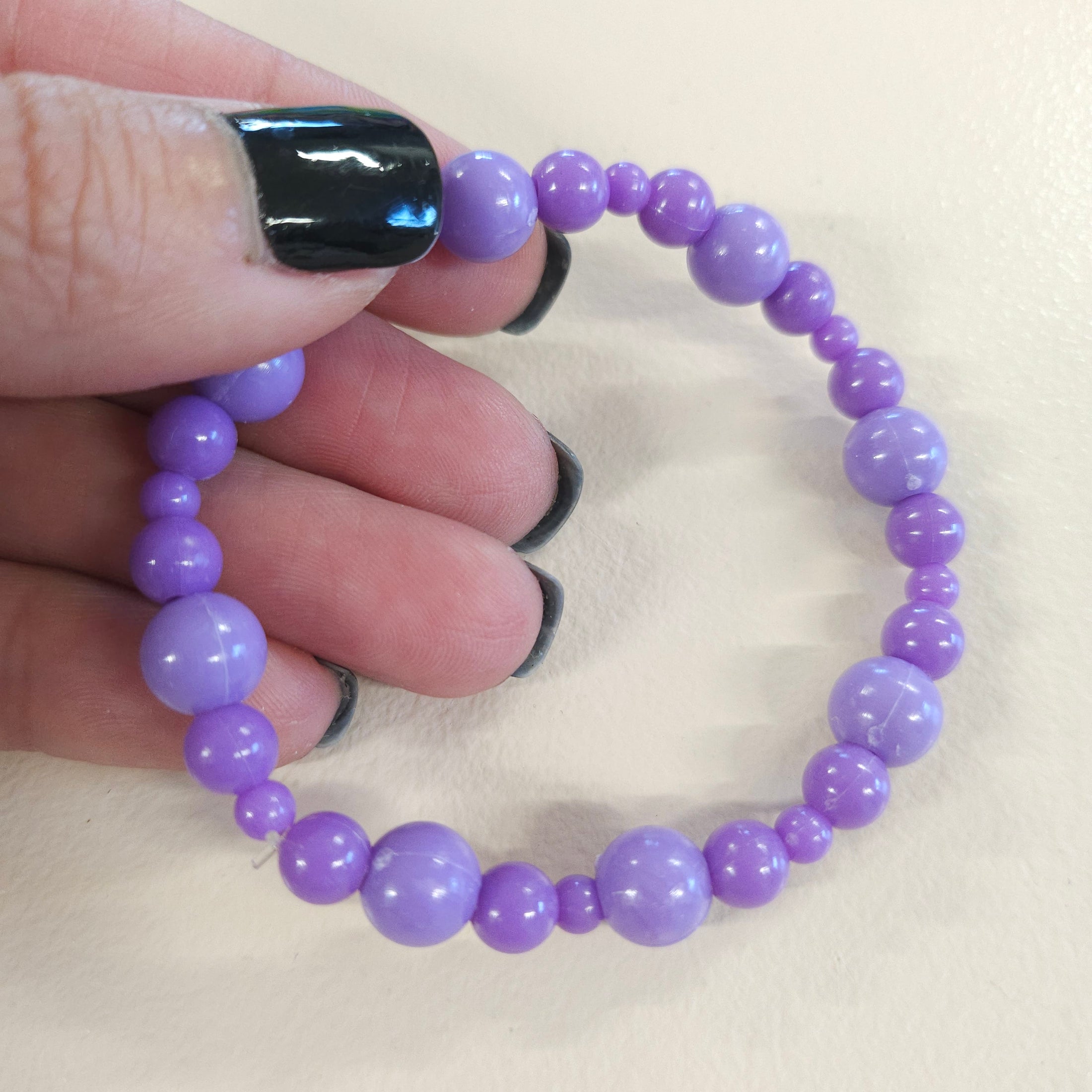 Purple ball bead stretch bracelet. 