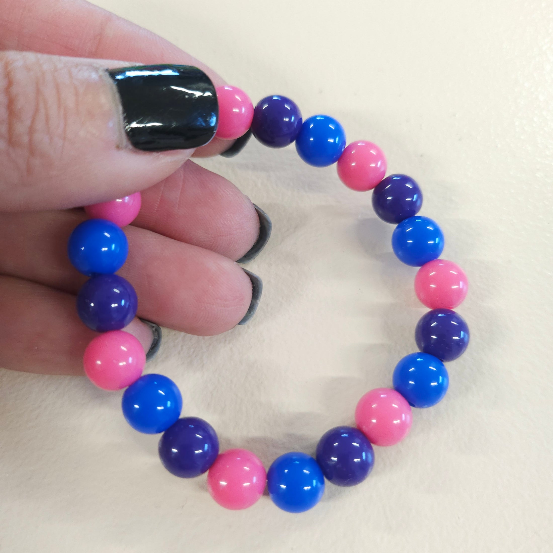 Blue, pink and purple ball bead stretch bracelet.