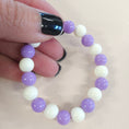 Load image into Gallery viewer, Purple and white gumball bead stretch bracelet. 
