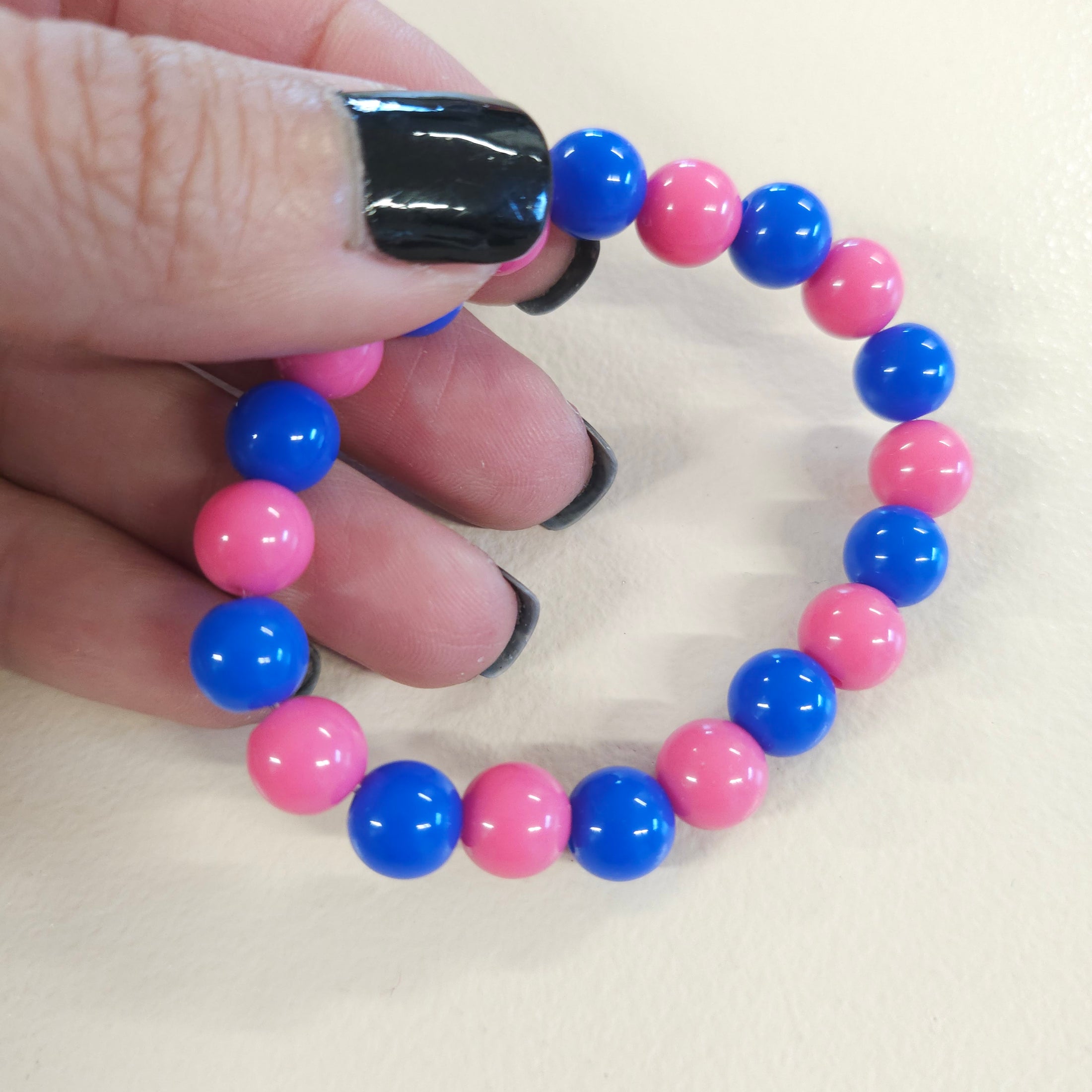 Pink and blue round ball bead stretch bracelet.