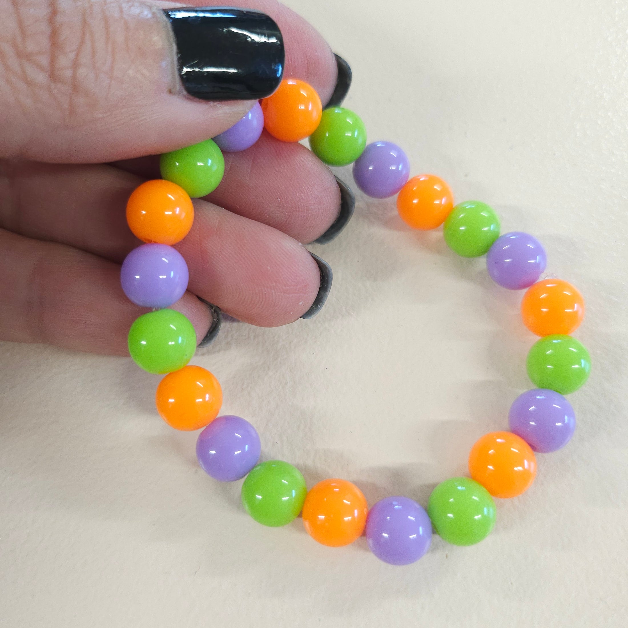 Halloween themed gumball bead stretch bracelet.