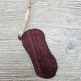 Load image into Gallery viewer, Yarn skein blank laser cut from exotic purpleheart wood.
