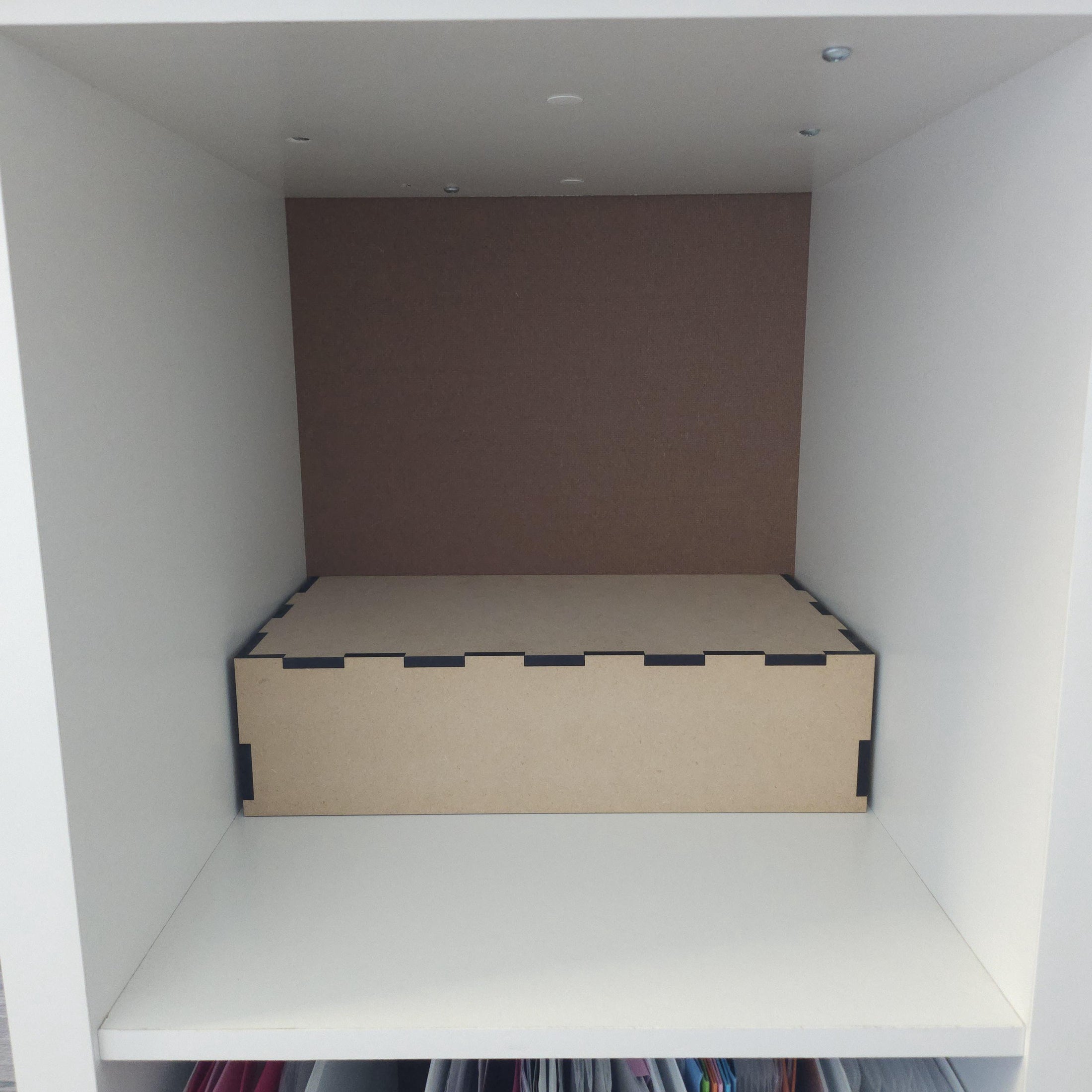 3.5" tall shelf riser for cube shelving.