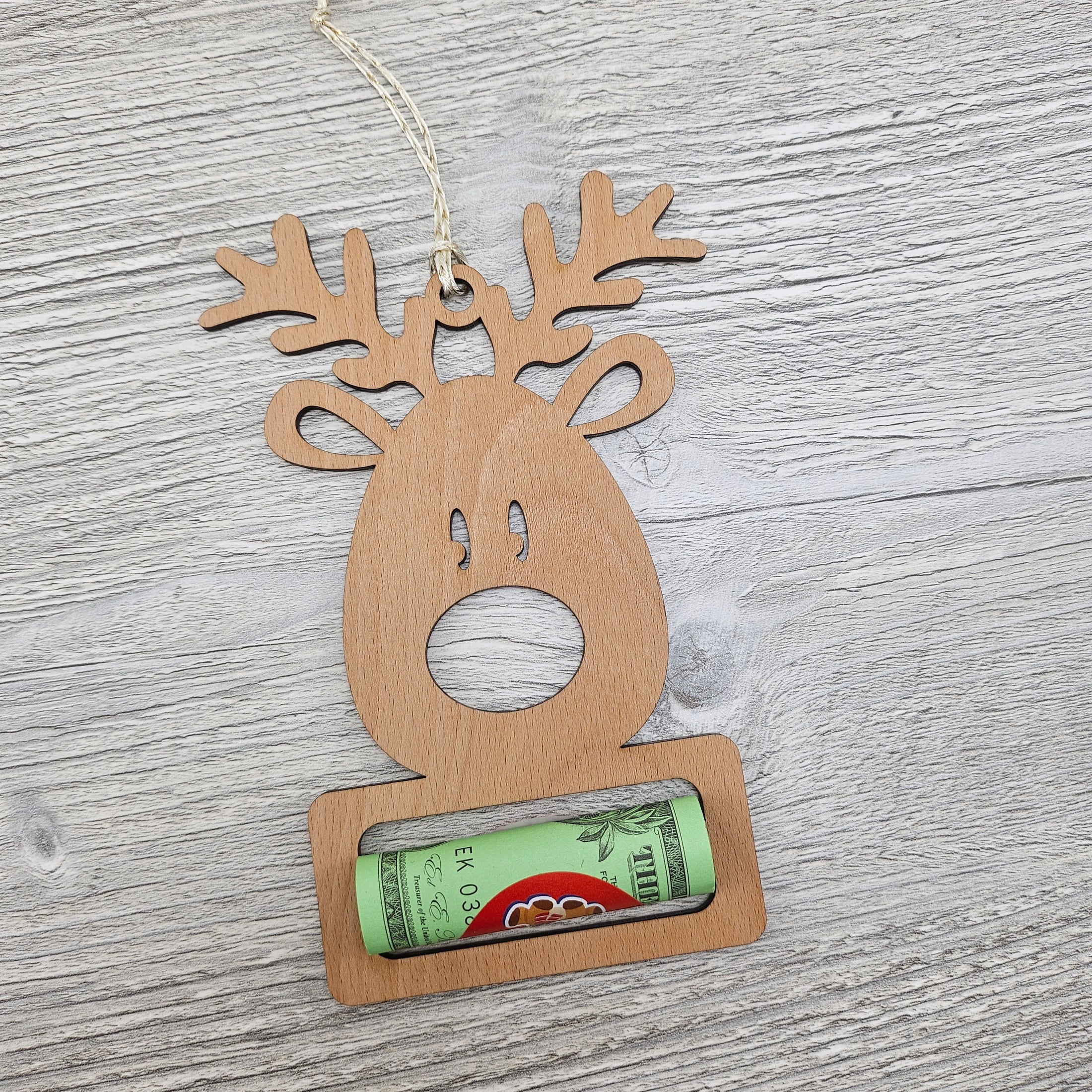 Reindeer shaped ornament cash holder gift.