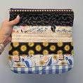 Load image into Gallery viewer, Sun and moon patchwork clutch purse.
