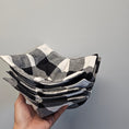 Load image into Gallery viewer, Black and white flannel bowl cozies.
