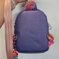 Load image into Gallery viewer, Blue bag with a colorful strap on a gray background
