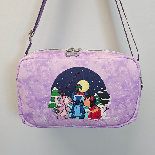 Purple bag with cartoon design on a light gray background