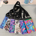 Load image into Gallery viewer, Colorful fabric bags with straps on a cutting mat
