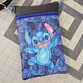 Load image into Gallery viewer, Blue character pouch on a checkered floor
