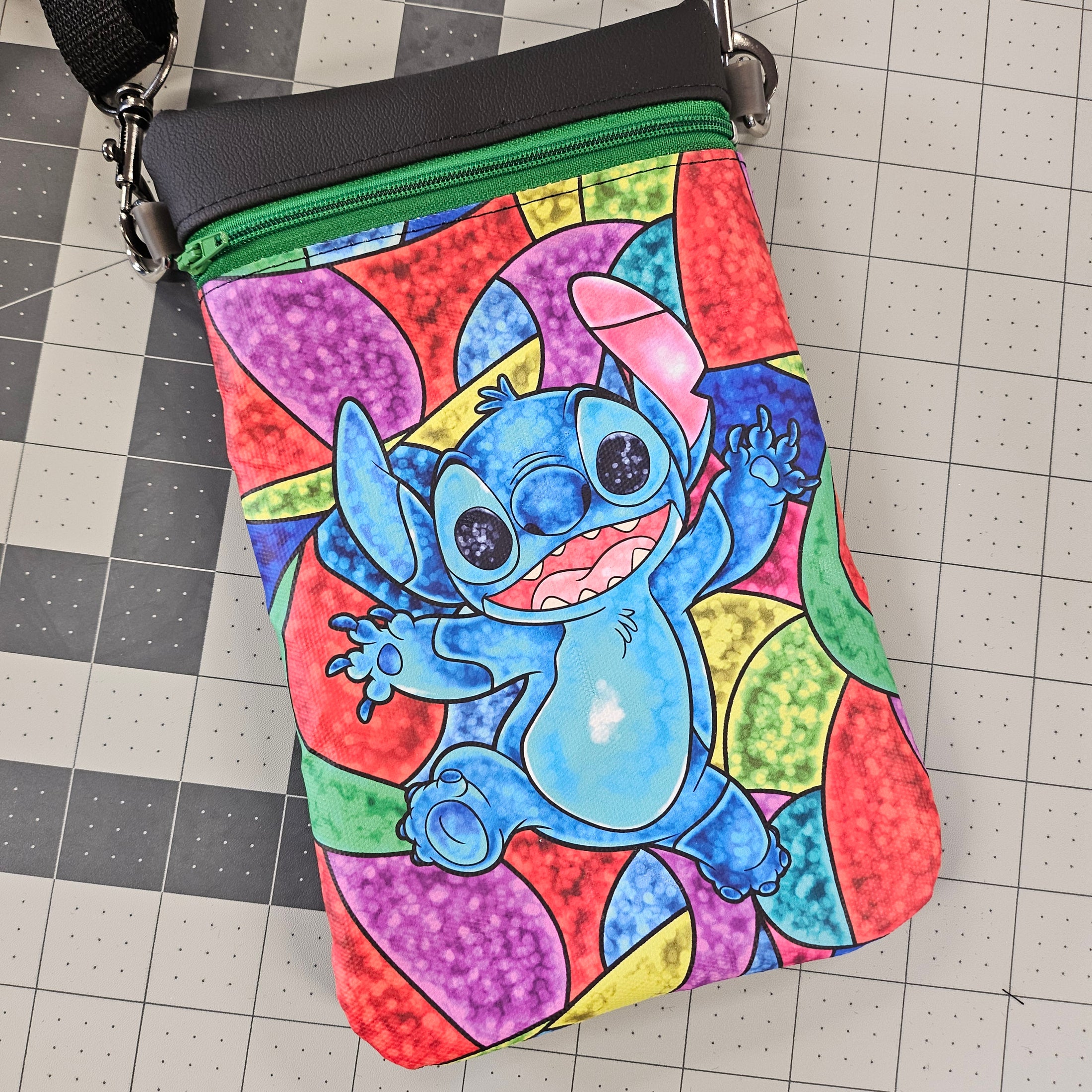 Colorful drawstring bag with a cartoon character on a grid background