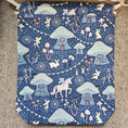 Load image into Gallery viewer, Dark blue drawstring bag with fairies and mushrooms.
