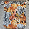 Load image into Gallery viewer, Drawstring bag featuring wild animals.
