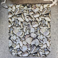 Load image into Gallery viewer, Petoskey stones themed drawstring bag with white ties.

