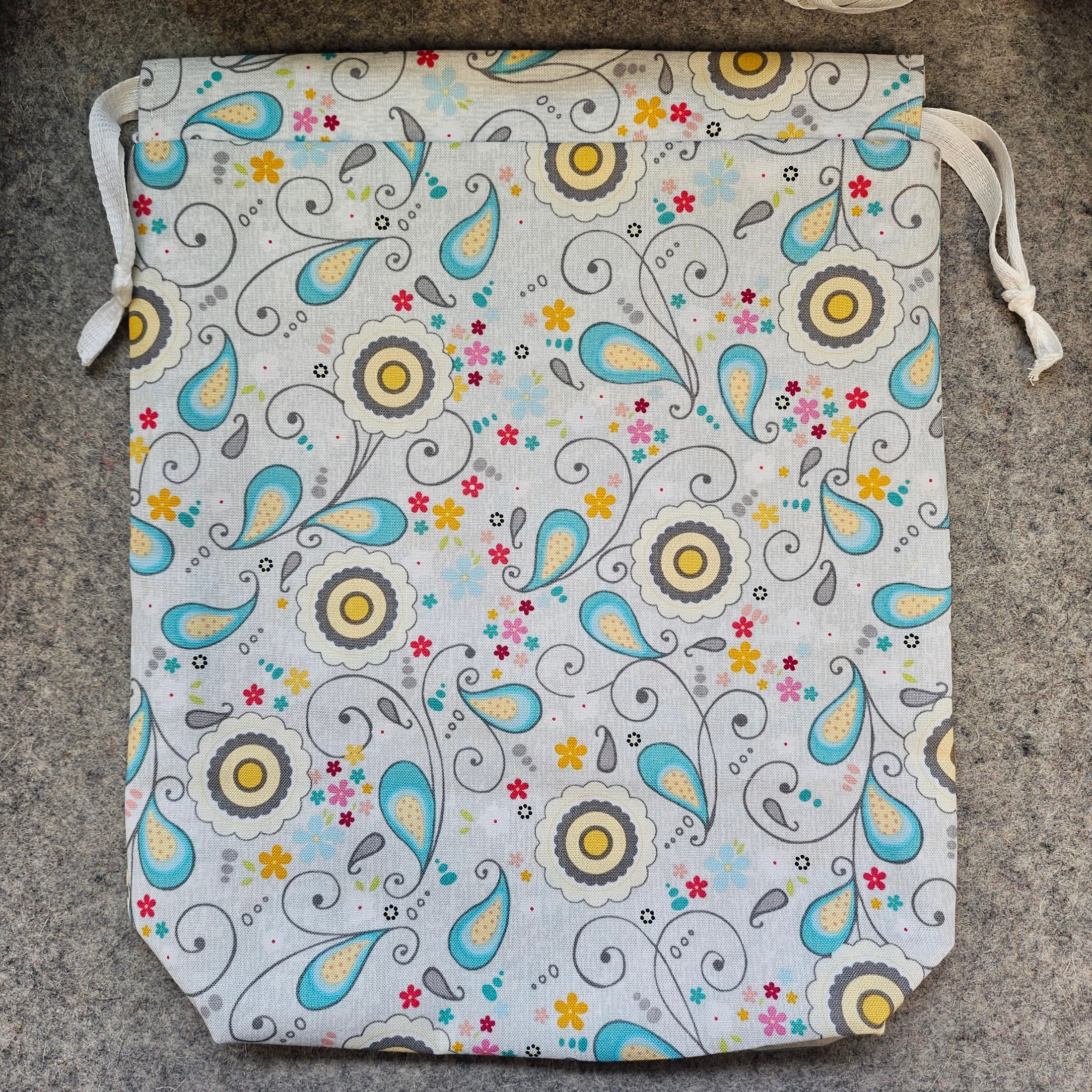 Easter themed drawstring bag with white ties.