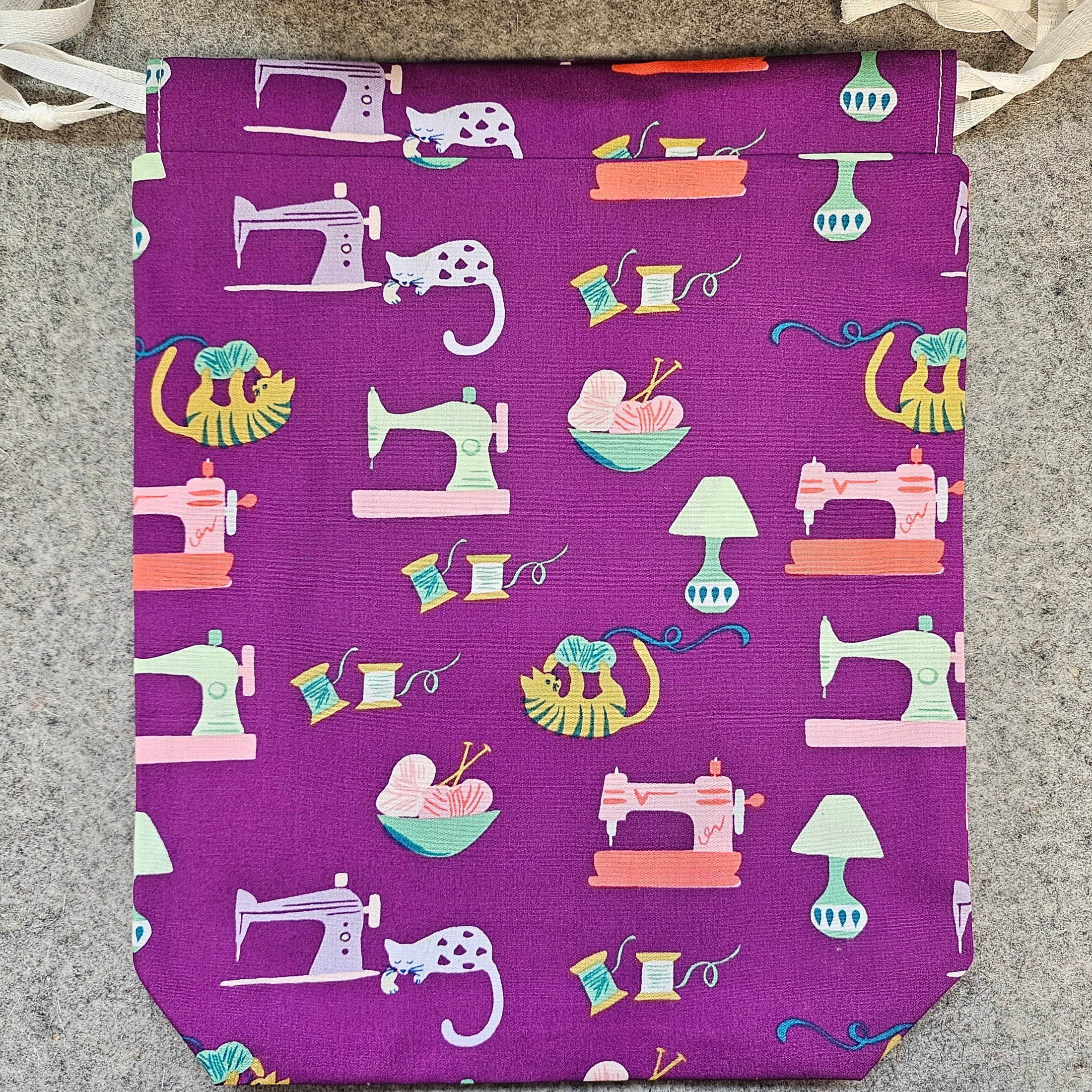 Sewing machine purple gift bag.