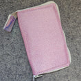 Load image into Gallery viewer, Pink glittery pouch on a gray surface
