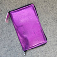 Load image into Gallery viewer, Purple metallic wallet on a gray concrete surface
