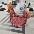 Load image into Gallery viewer, Decorative fabric wall hanging with floral patterns on a tiled wall.
