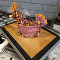 Load image into Gallery viewer, Floral-patterned oven mitts on a baking tray with a silicone mat in a kitchen setting.
