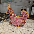 Load image into Gallery viewer, Decorative chicken-shaped hot pad on a kitchen counter with oil and soy sauce bottles in the background.
