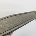 Load image into Gallery viewer, Close-up of a textured gray strap with stitching on a white background
