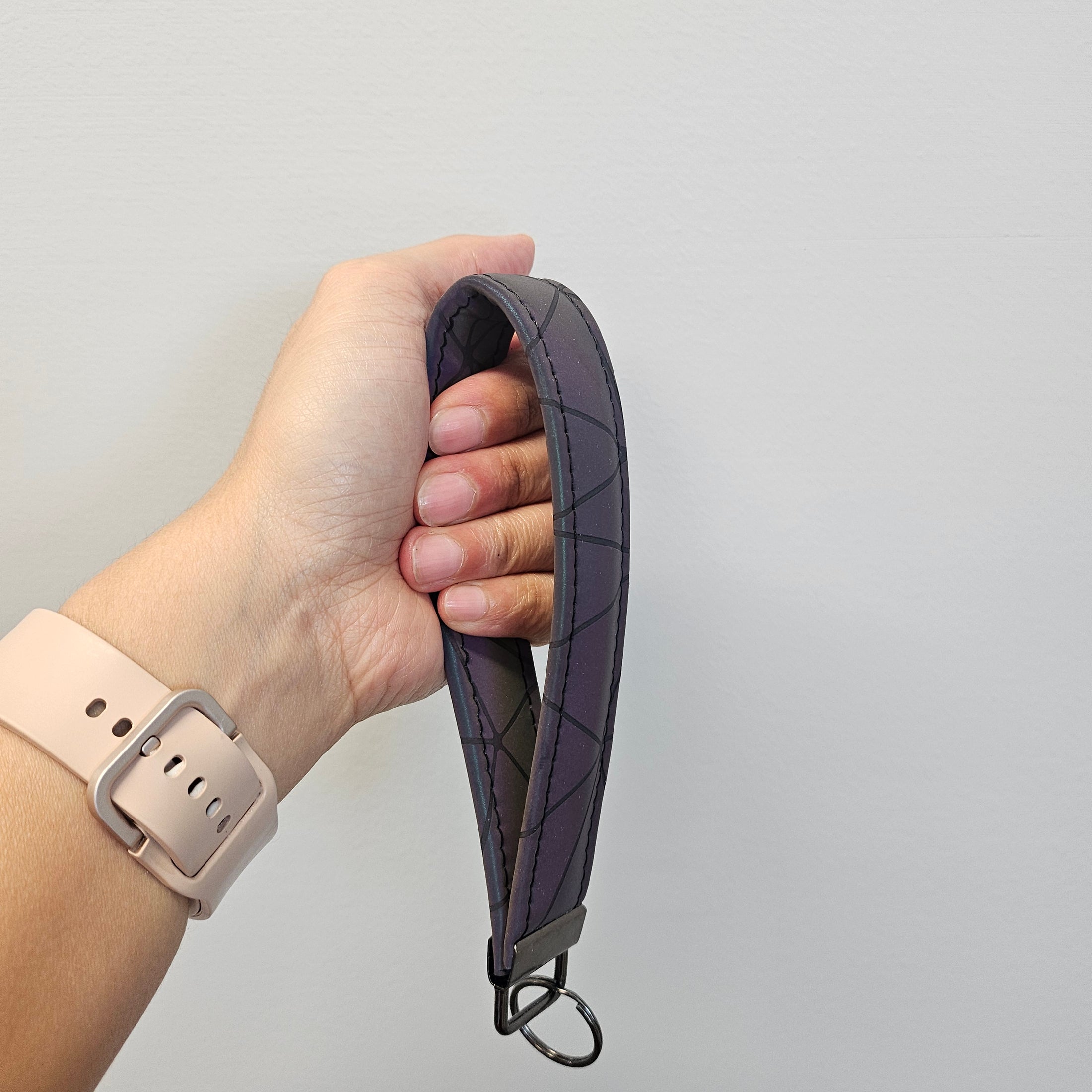Faux leather shimmery dark purple key fob.