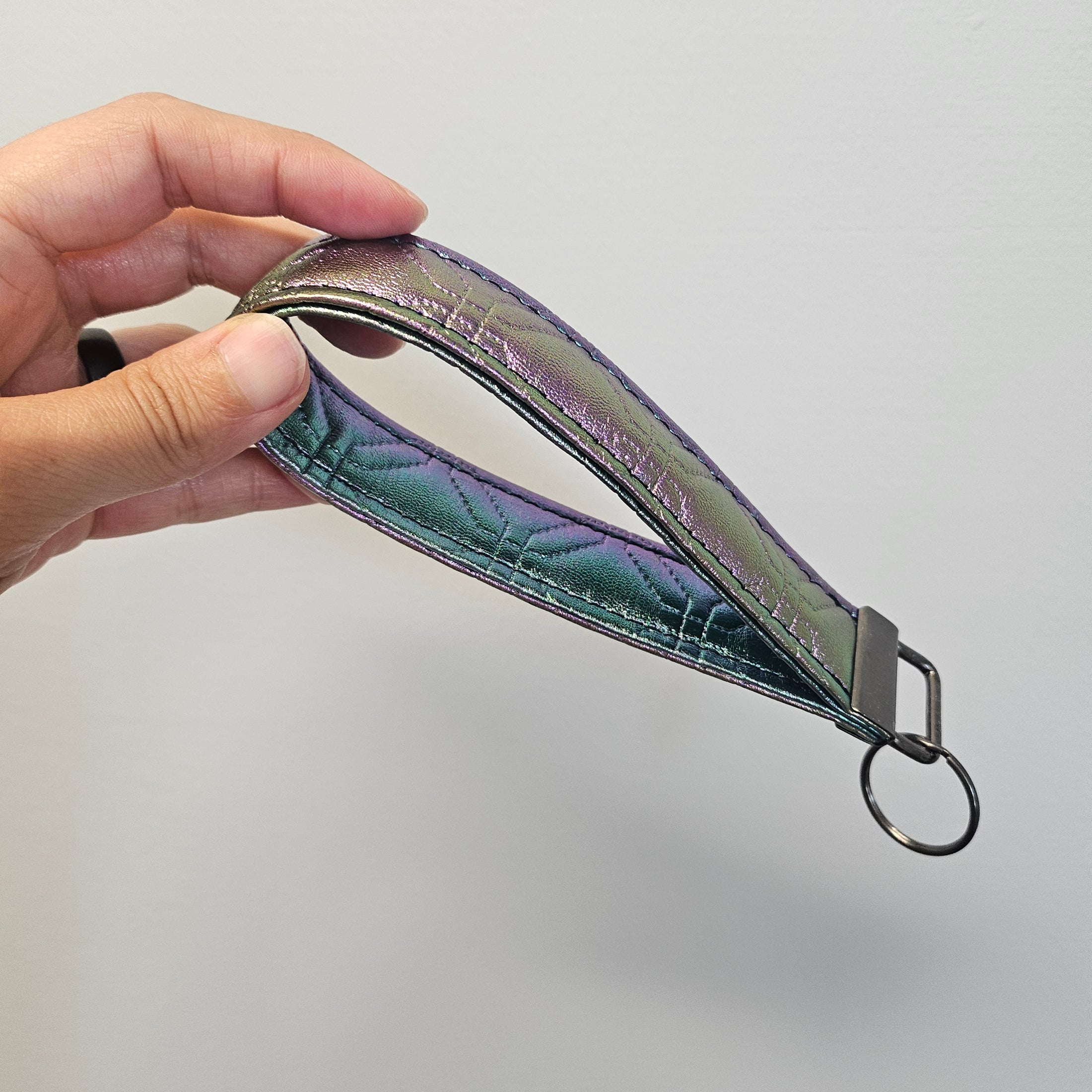 Metallic gradient vegan leather key fob.