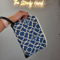 Load image into Gallery viewer, Blue and cream wristlet pouch.
