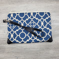 Load image into Gallery viewer, Blue and cream wristlet pouch with detachable strap.
