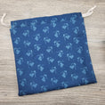 Load image into Gallery viewer, Dark blue drawstring project bag for cross stitch.

