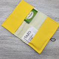 Load image into Gallery viewer, Yellow and cream interior of tea bag wallet.
