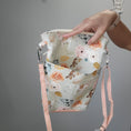 Load image into Gallery viewer, Floral llama shoulder purse with multiple zippers. 
