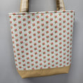 Load image into Gallery viewer, Back of the bluebirds tote bag with small pink and green flowers. 
