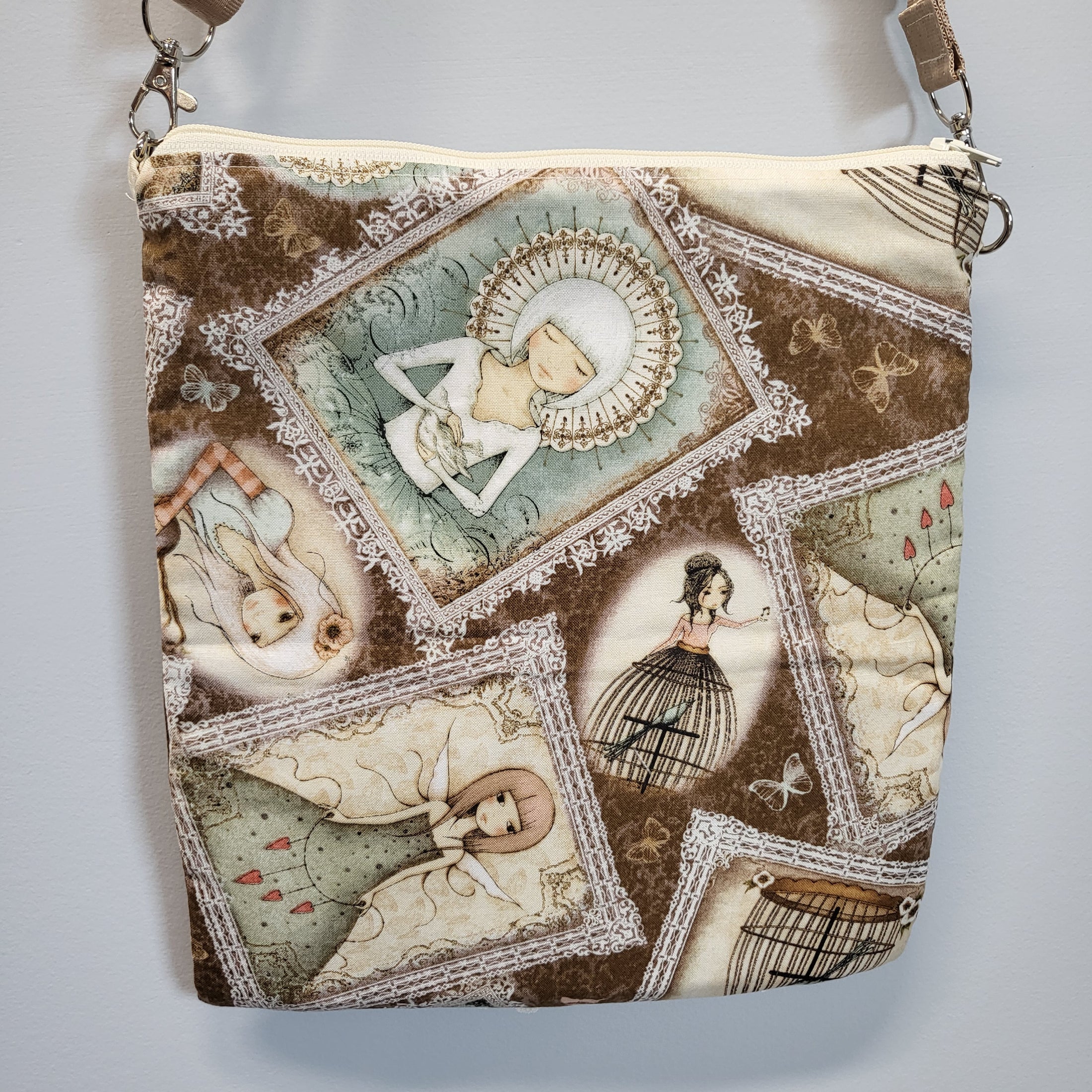 Back of the musical lady purse featuring other ladies and fairies. 
