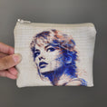 Load image into Gallery viewer, Swiftie zipper pouch with an sketched image of taylor swift on the front. 
