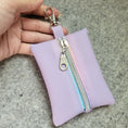 Load image into Gallery viewer, Light purple mini zipper pouch included with the Mario Kart inspired bag. 
