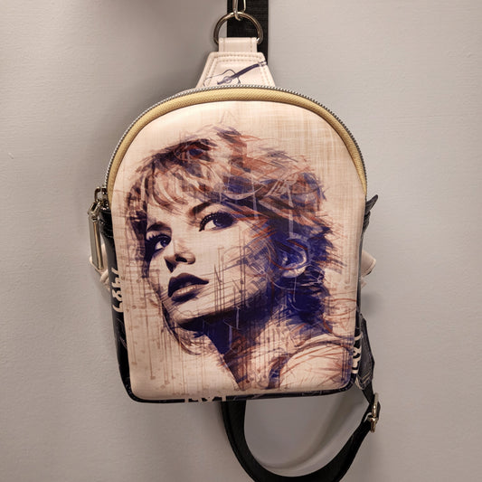 Swiftie sling bag with sketched image of Taylor Swift's face on the front. 