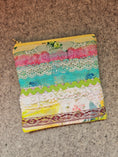 Load image into Gallery viewer, Watercolor lace zipper pouch embellished with lace and rick rack. 

