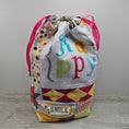 Load image into Gallery viewer, Happy quilted, flat bottom, drawstring bag.
