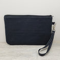 Load image into Gallery viewer, Black back on the cameo zippy clutch.
